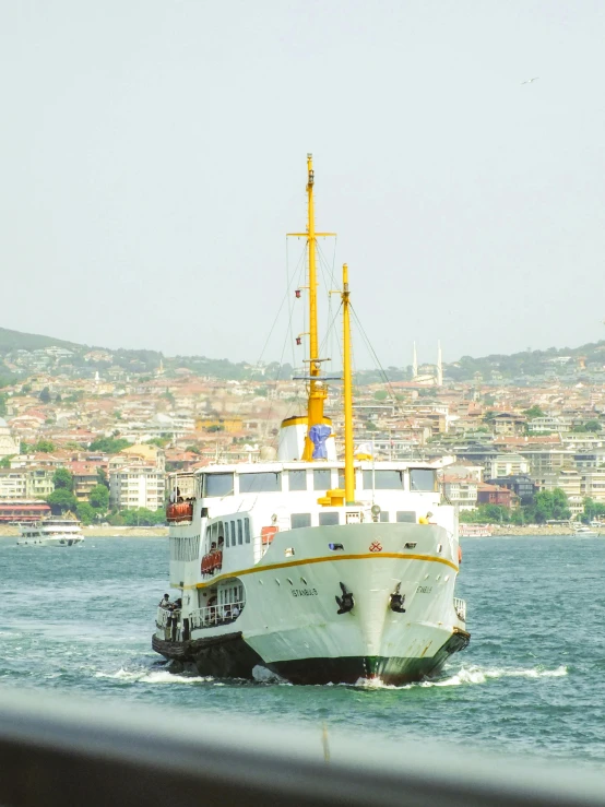 a boat traveling on the water near a dock