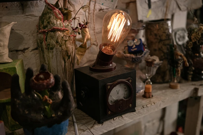 a lamp is on top of a mantle