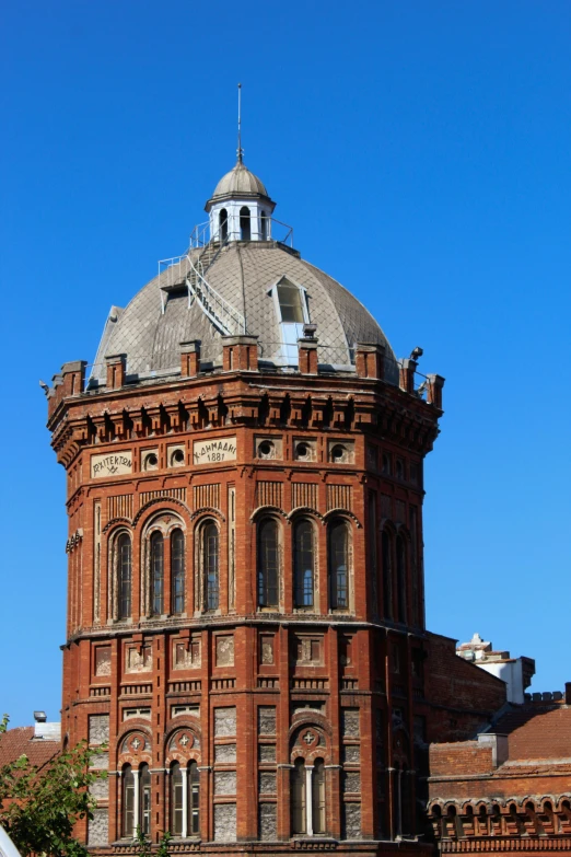 a big building with a clock on the top of it