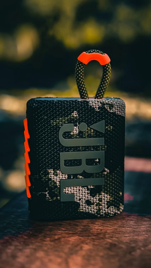 an oriental style black bag on top of a table