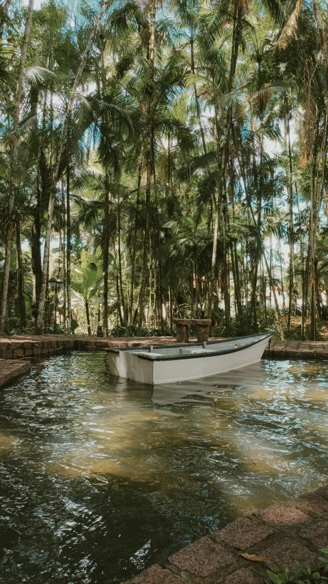 a boat that is sitting in some water