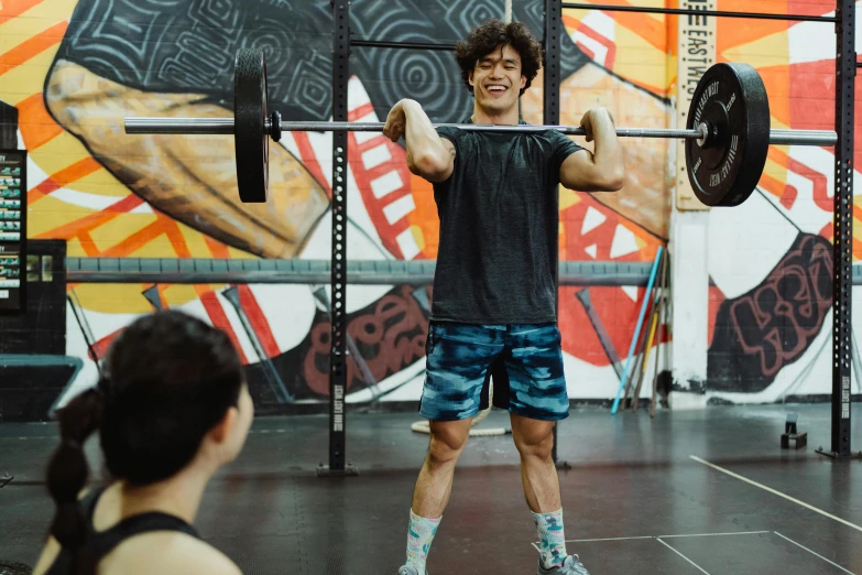 a man working on his muscles in the gym