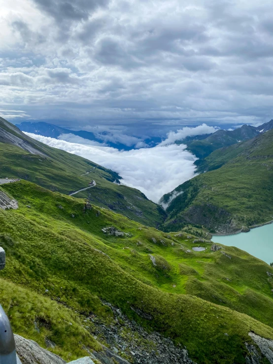 a very pretty view from a mountain overlooking the water