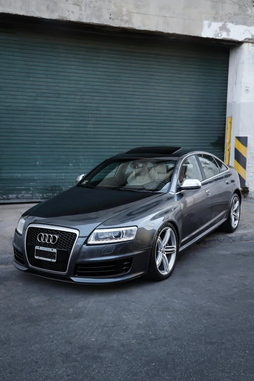 an audi s8 is parked in a parking lot