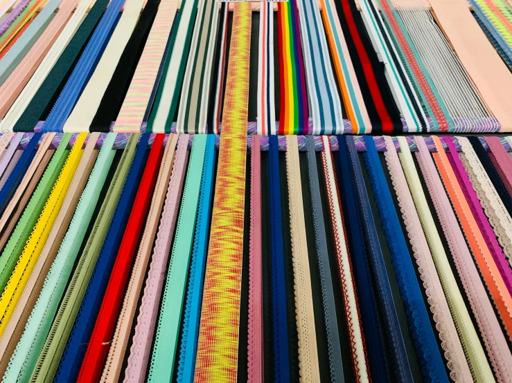 some fabric that is very long and brightly colored