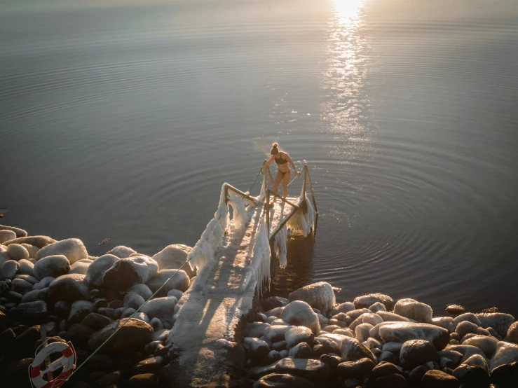 an image of a man doing water skiing