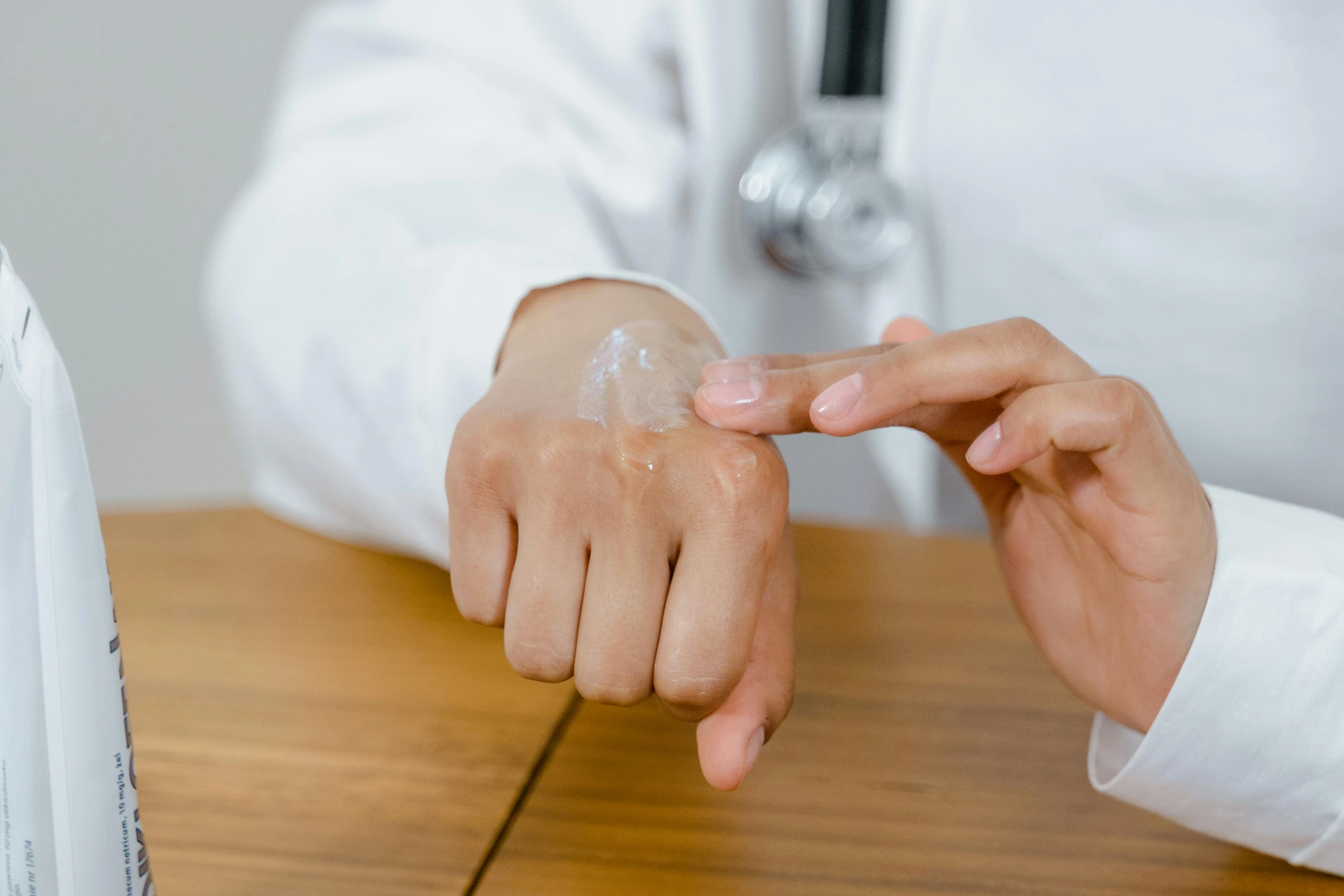 a male doctor peeling with a hand scrub