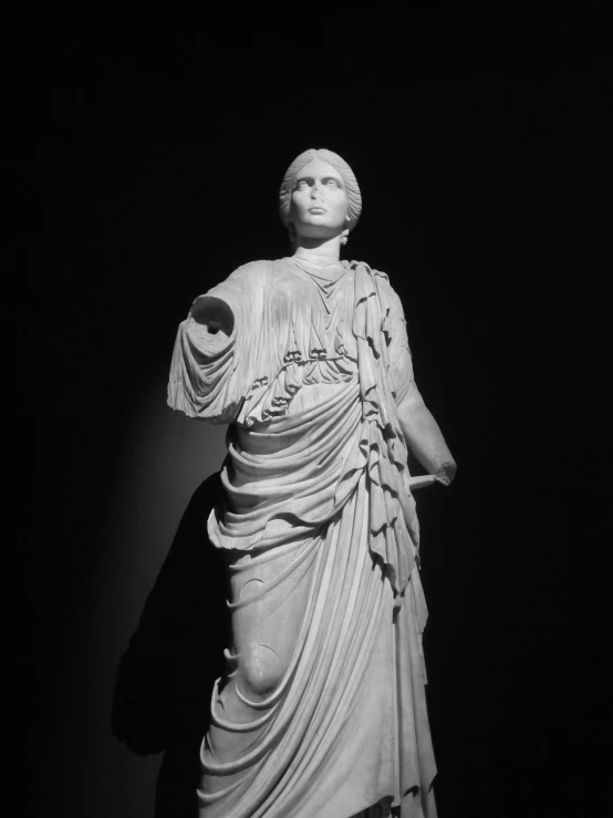 black and white pograph of a statue of a person