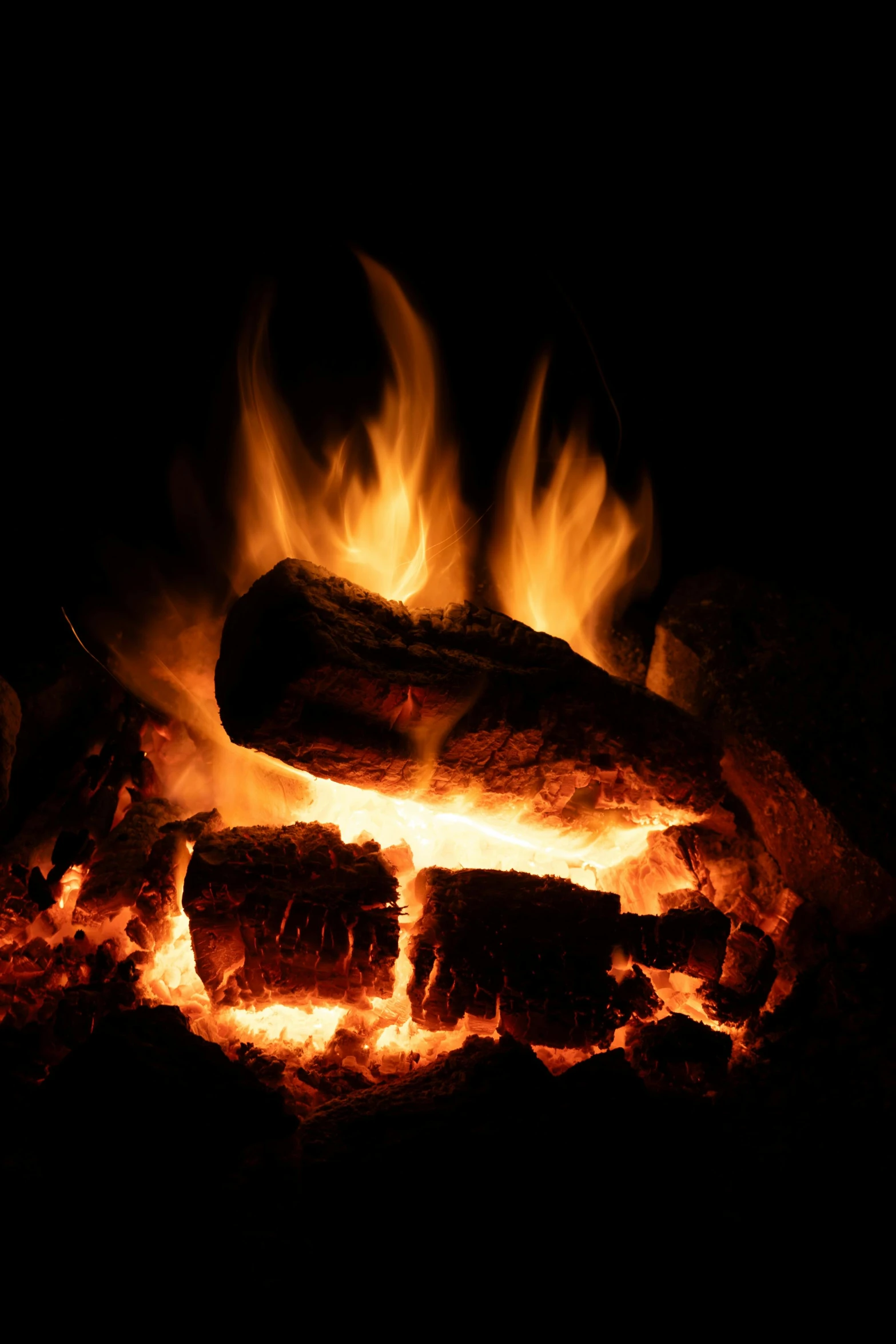 close up of fire showing the bright orange flame