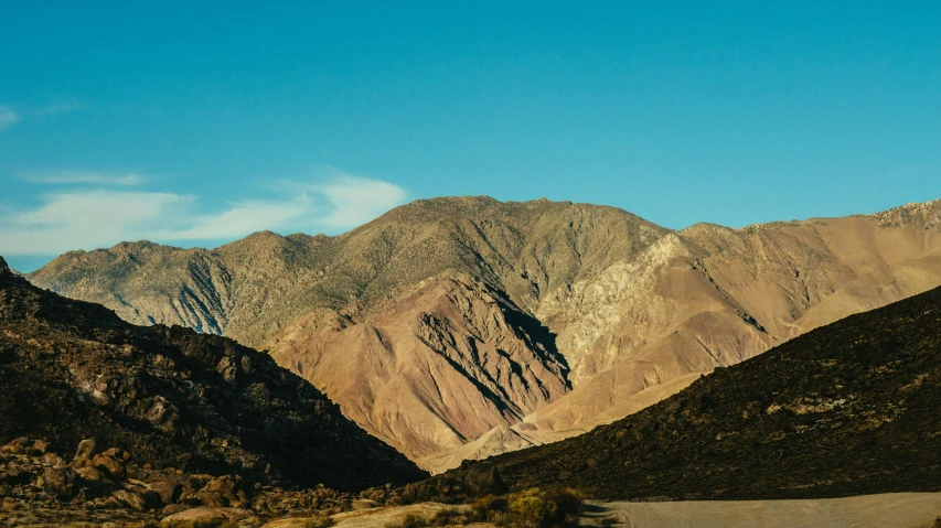 a scenic view of mountains and valleys at the desert