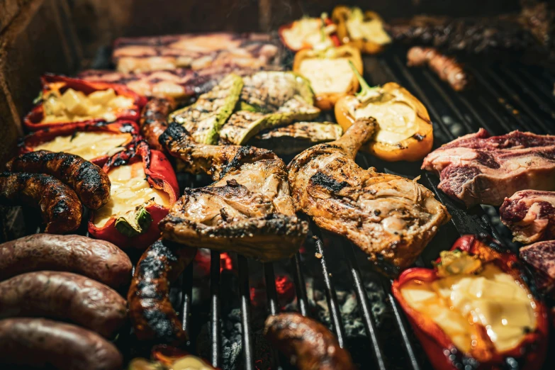 some vegetables that are being grilled on a grill