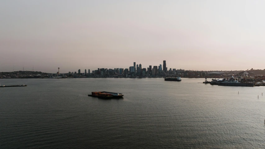 a city is seen over a body of water