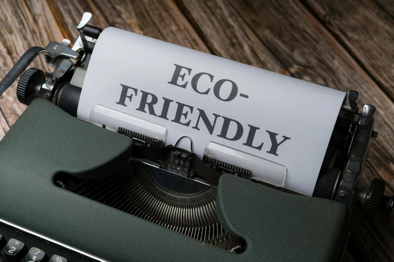 the words eco friendly written on a paper on an old typewriter