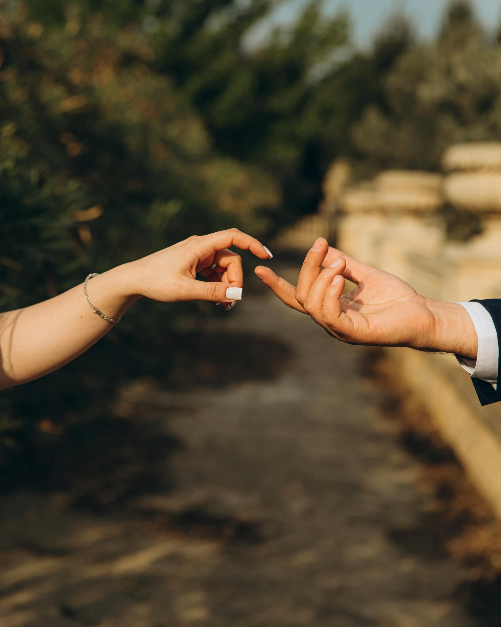 a close up of two people handing each other soing