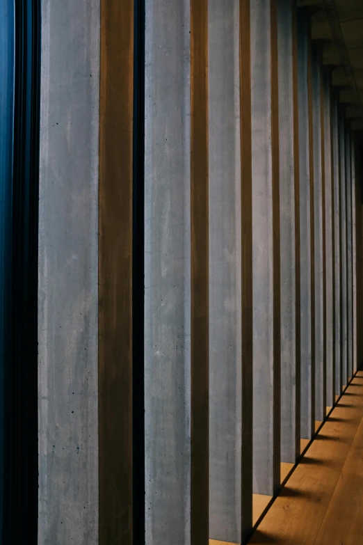 the long row of pillars in an empty room