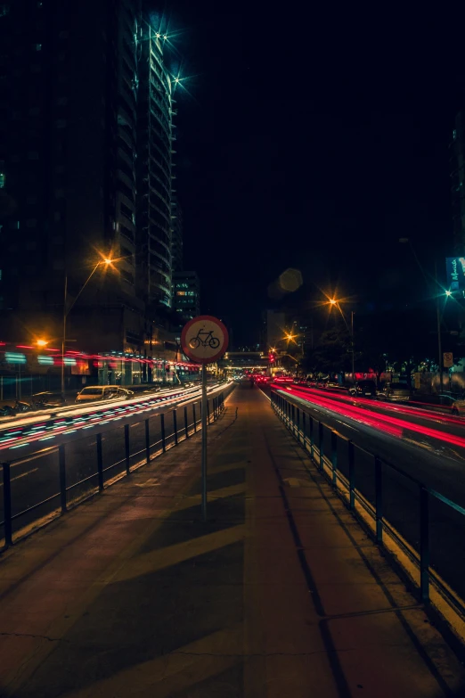 dark city streets with long - exposure blurs at night