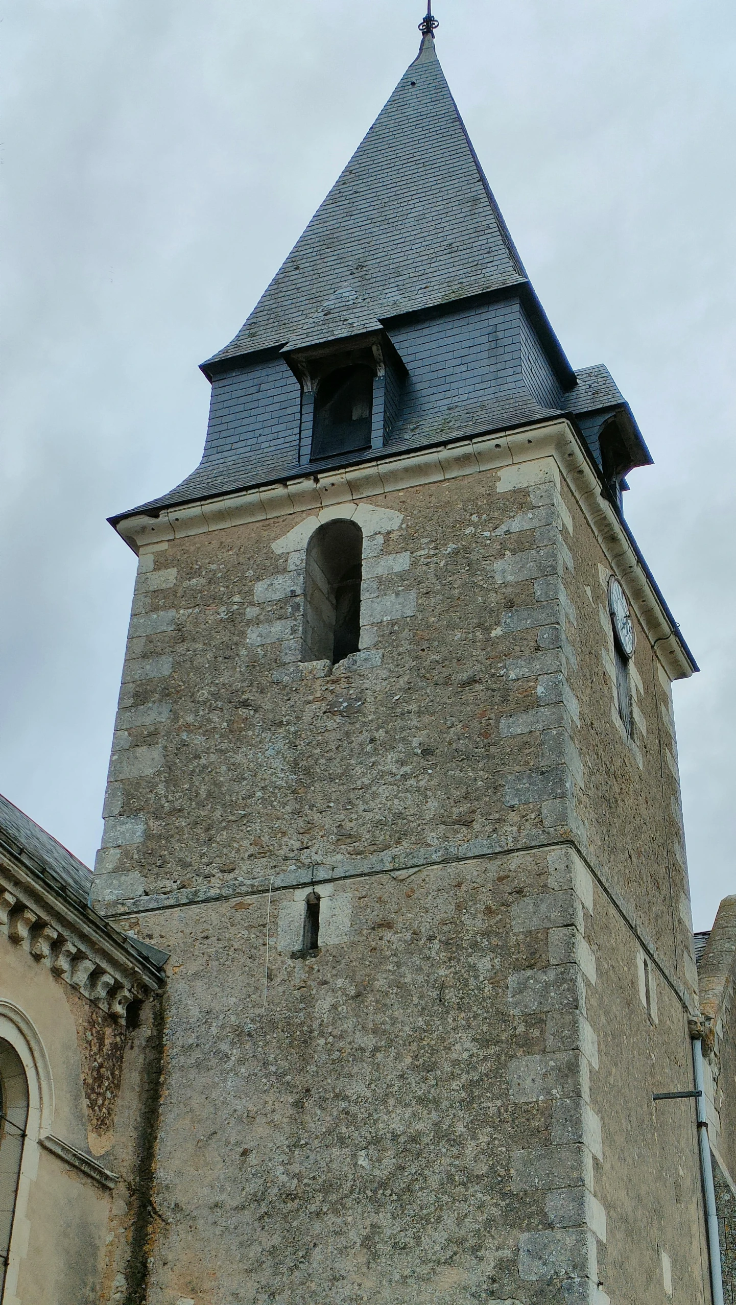 an old tower with two chimneys is very tall