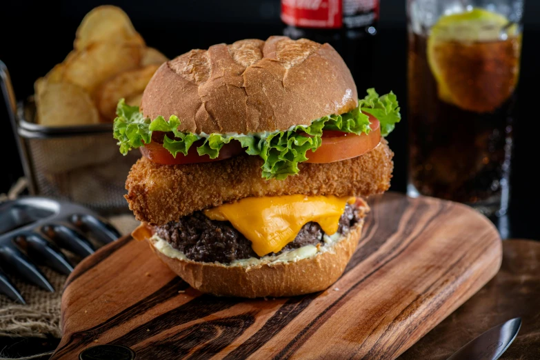 a hamburger with a large hamburger bun on it