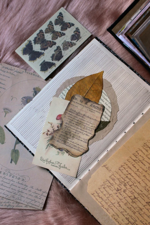 several pieces of vintage paper spread out on top of each other