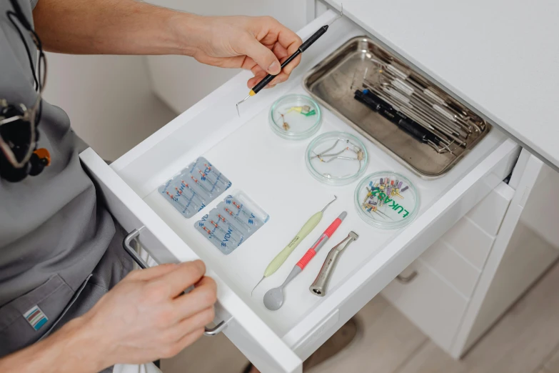 a person is  up various items to make a plate