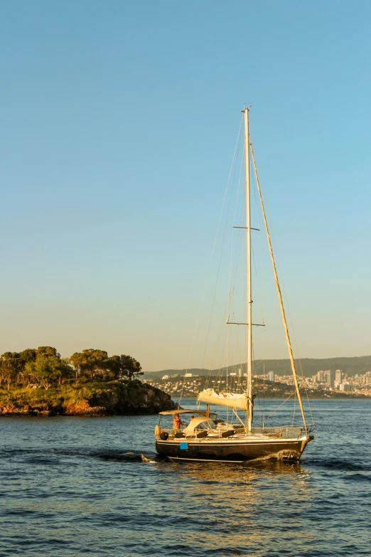 a sailboat that is sailing on some water