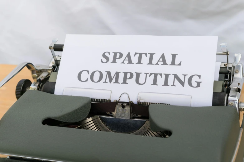 a sheet of paper that reads'snail computing'on an old typewriter