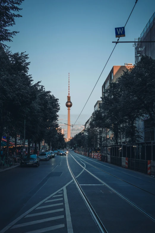 a street that has a street light in the background