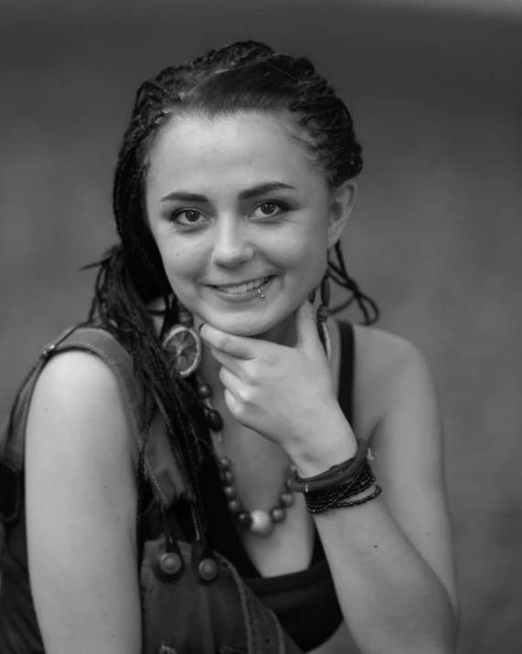 black and white pograph of young woman smiling