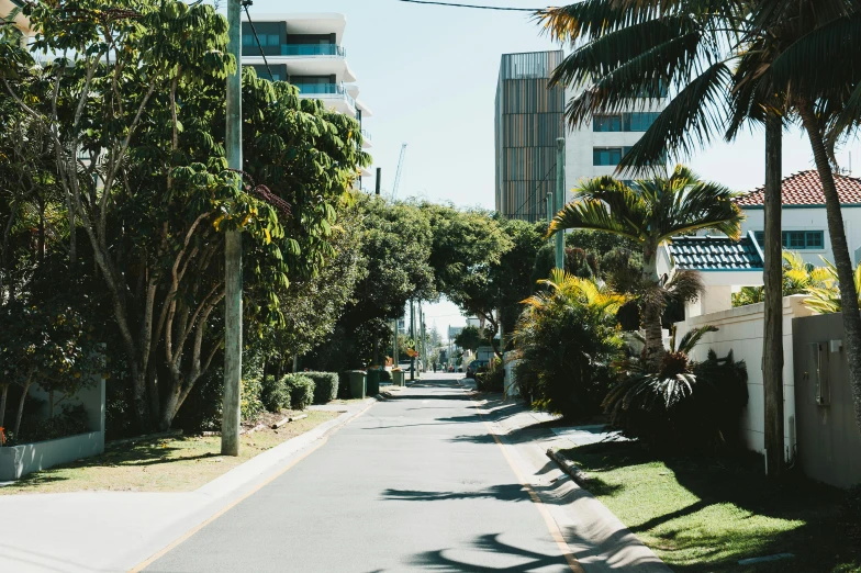 this is a long narrow city street with buildings