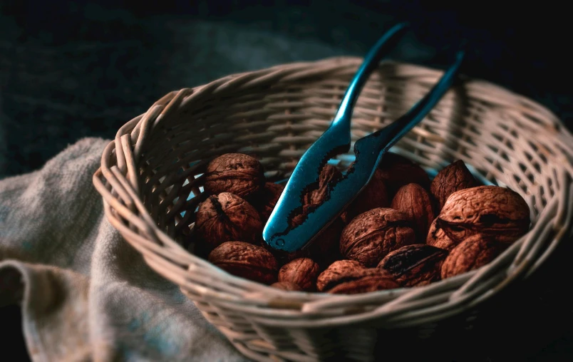 a bowl full of nuts that are sitting on a table