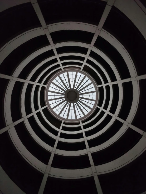 an indoor circular ceiling light with a circular window