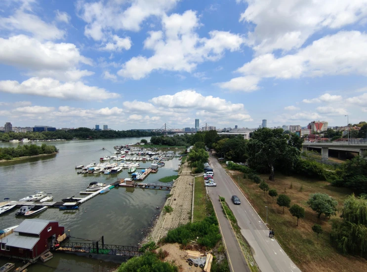 a bunch of boats sit on the water