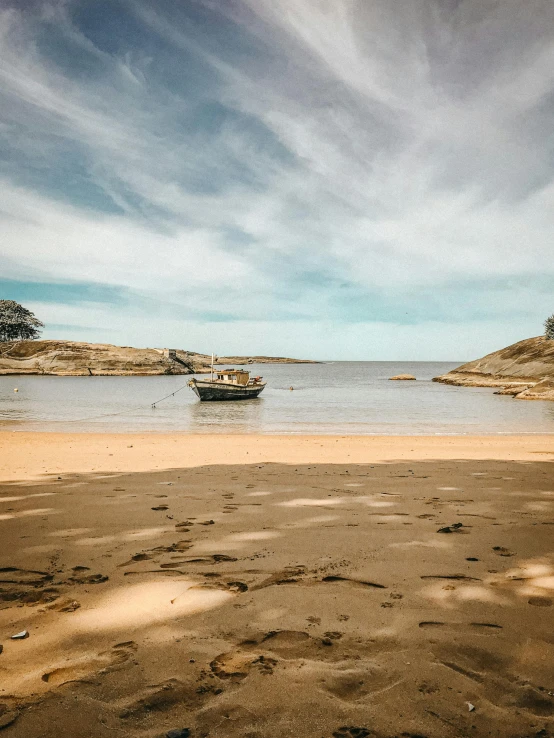 boats in the ocean on a sunny day