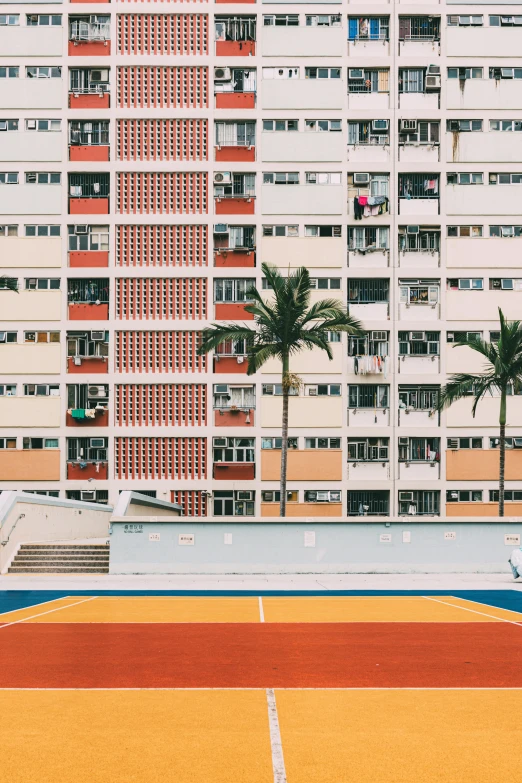 the building has a lot of balconies that are colorful