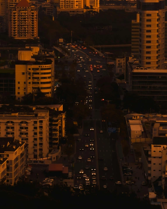 cars driving along an expressway in the city