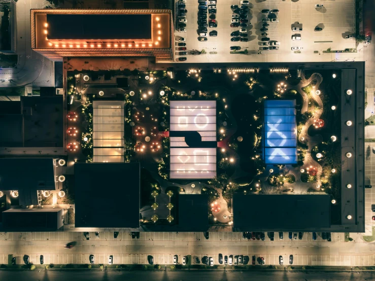 an aerial po of an intersection of a city at night