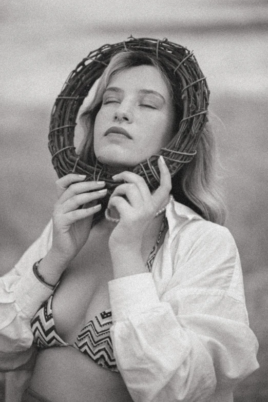 a woman in a white shirt is posing for a po