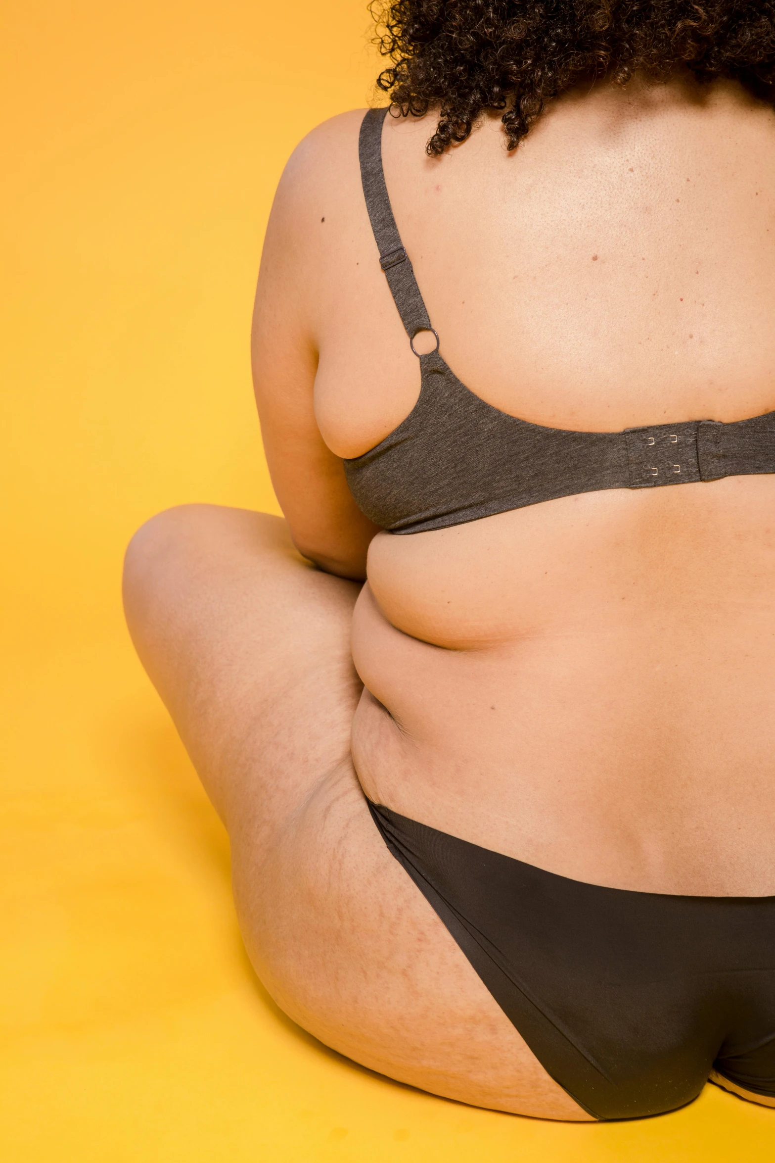 a woman with very thin belly wearing a black 