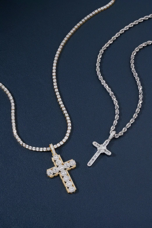 a cross pendant is shown on a black background