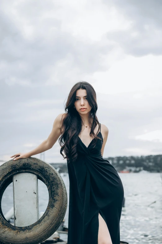 a woman standing on a boat looking up