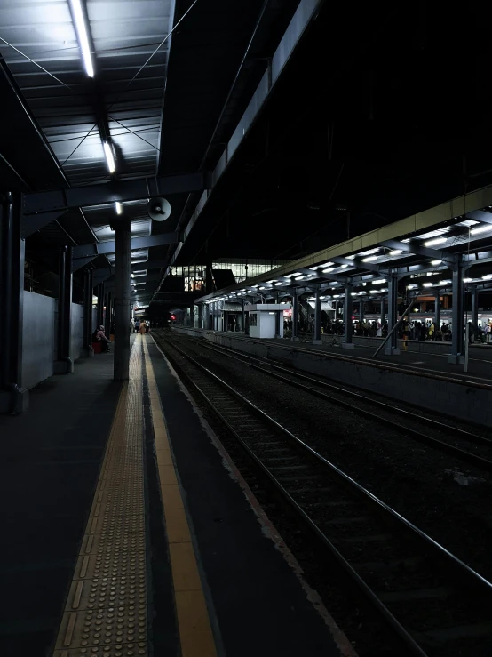 the light shines on an empty train platform