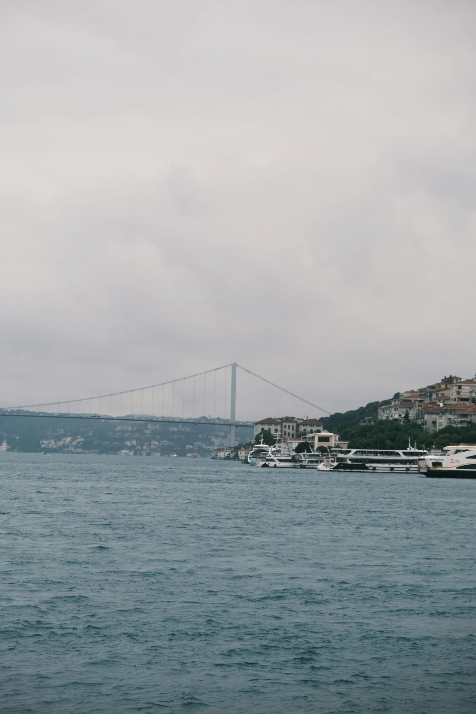 a city view with a boat out on the water