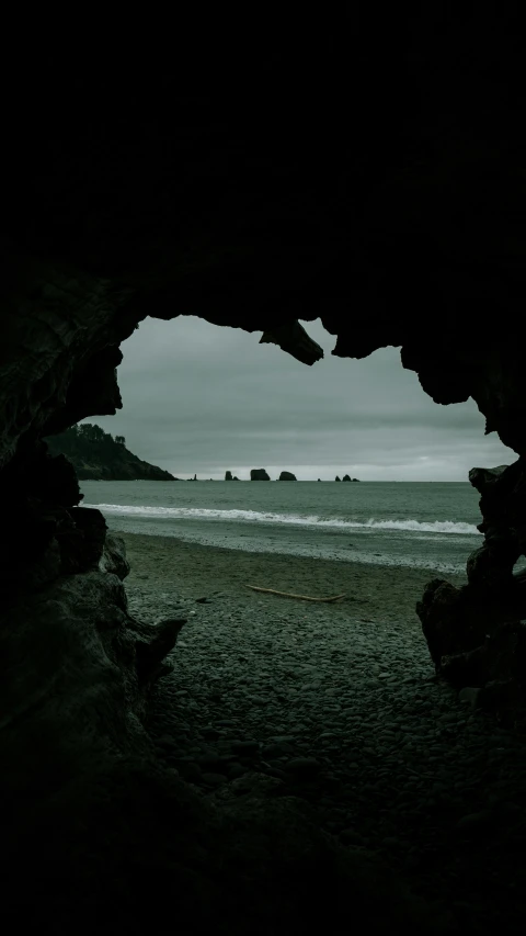 an open window that looks out over the ocean