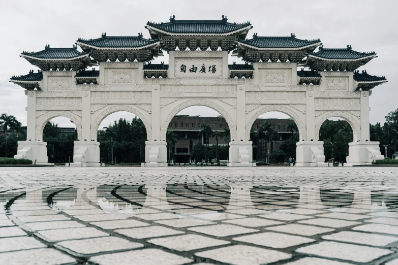 an oriental building with a clock tower on the top