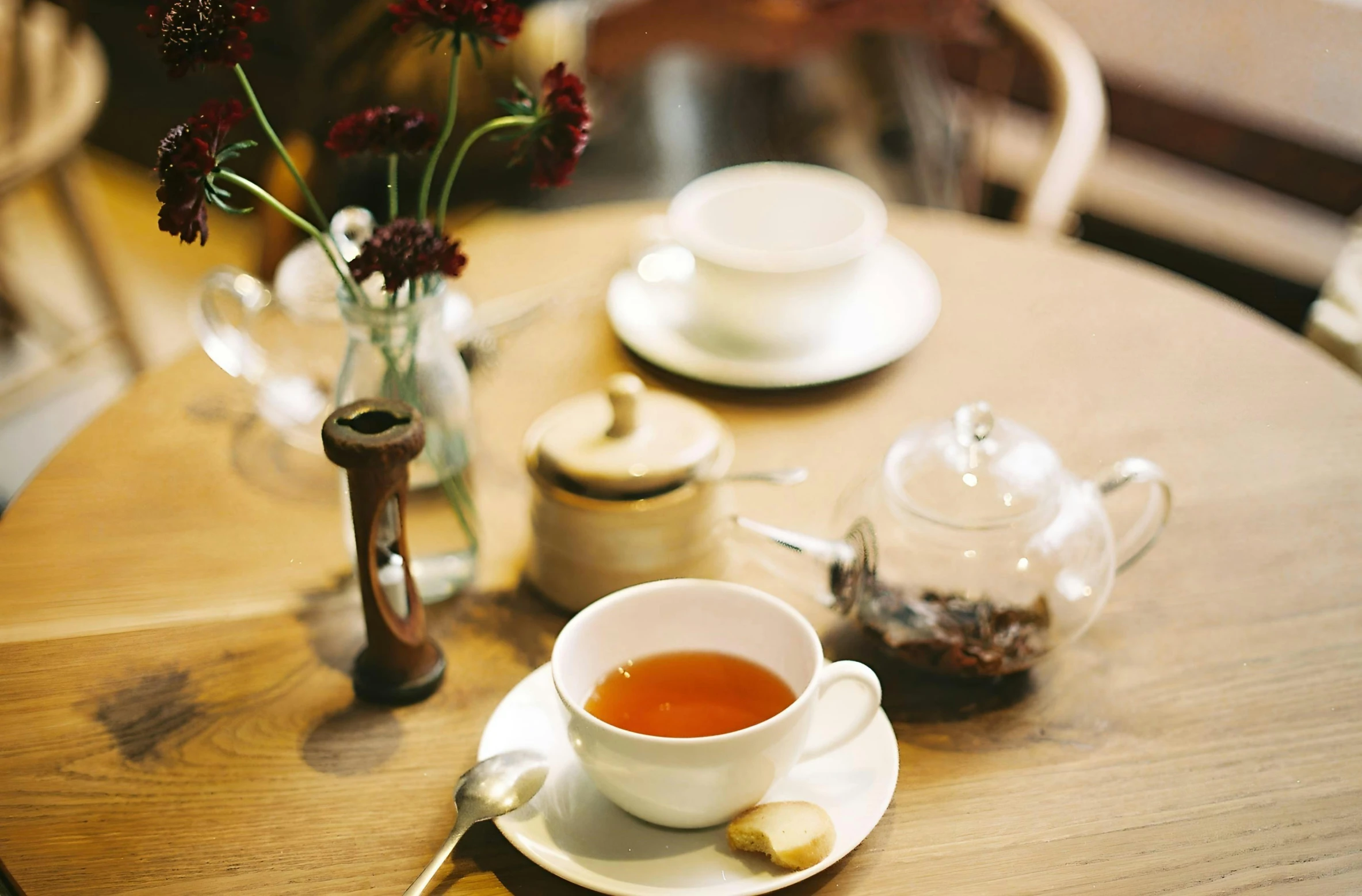 a close up of a plate with a cup and saucer on it