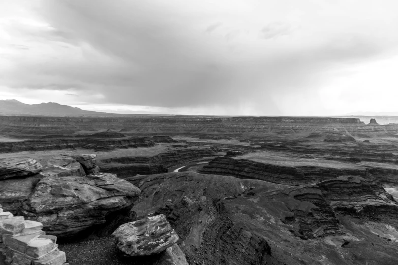 a mountain landscape with a valley in the distance