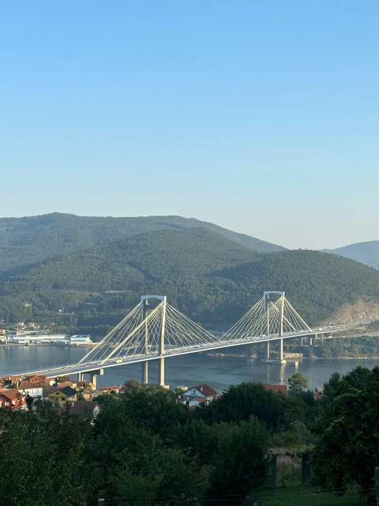 the bridge in the distance is looking at a city below