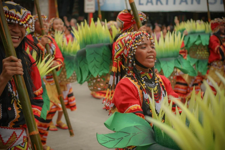 an image of people in a parade with bright clothing