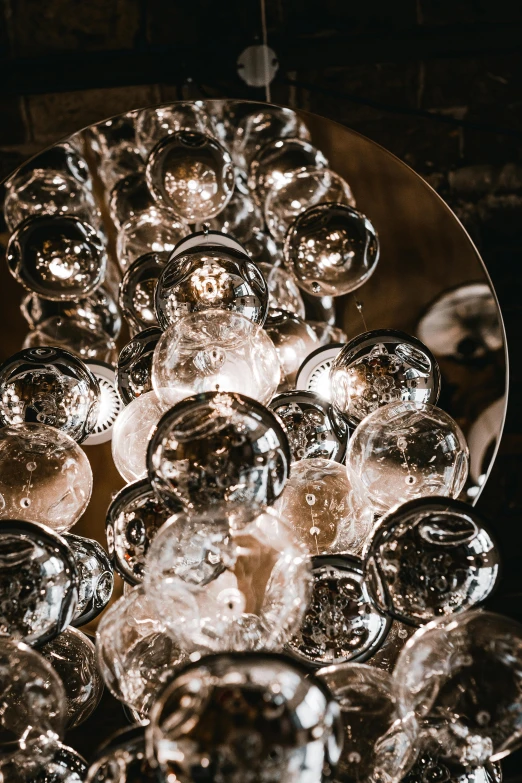 a glass ball with many bubbles sitting on top