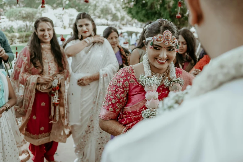 a bride laughing at her groom at her wedding